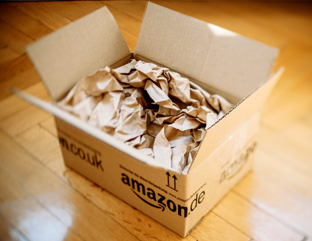 Amazon parcel opened on home parquet floor
